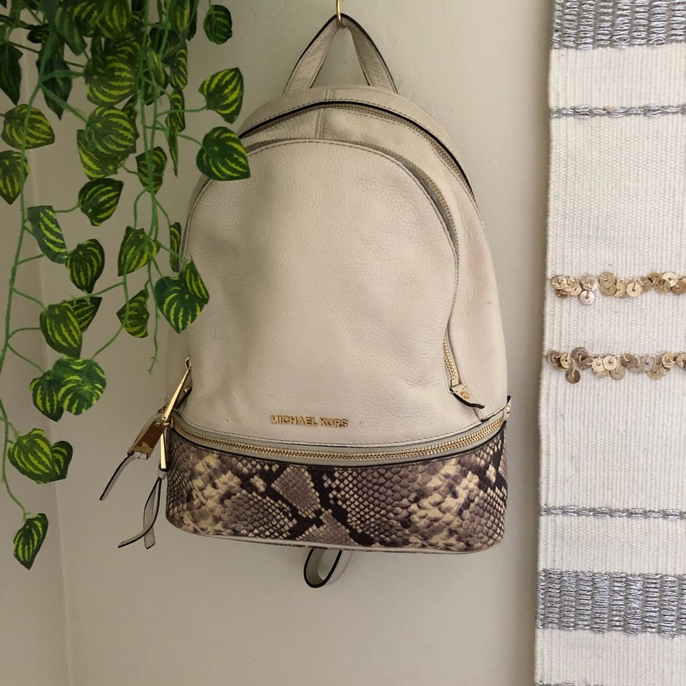 Micheal kors cream and snake print backpack